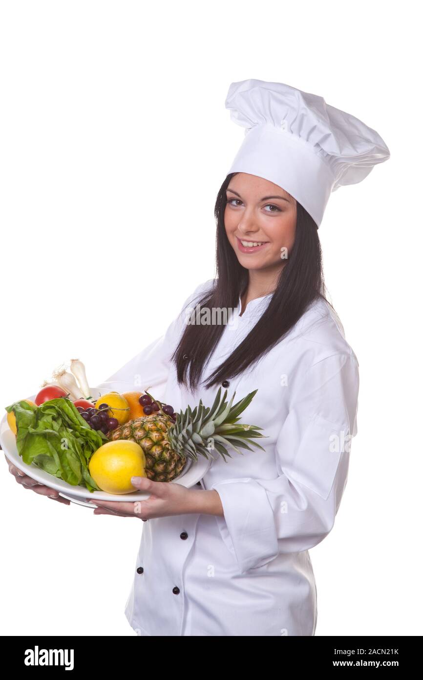 Cook serves a fruit and vegetable bowl Stock Photo