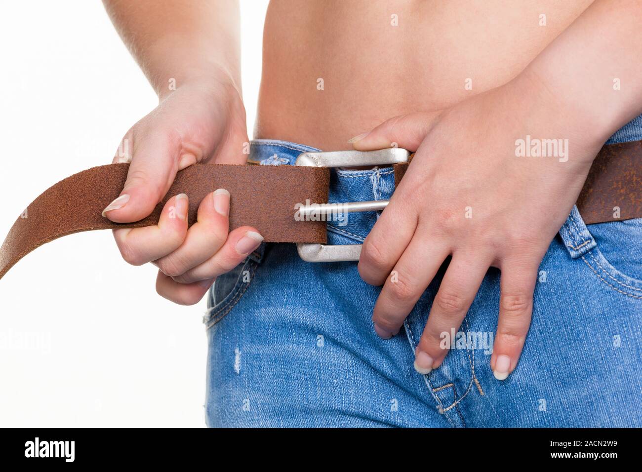 Woman tighten belt Stock Photo Alamy