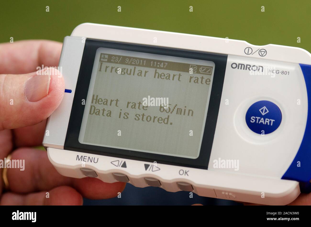 Display of a cardiac monitor for home use being examined after being