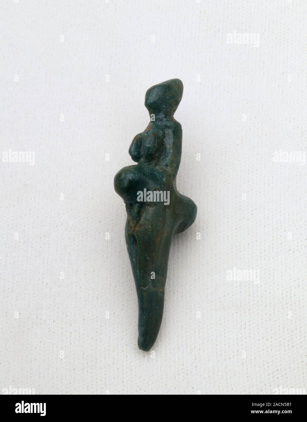 Soapstone Venus. Cast of a figure of a woman carved in soapstone. The