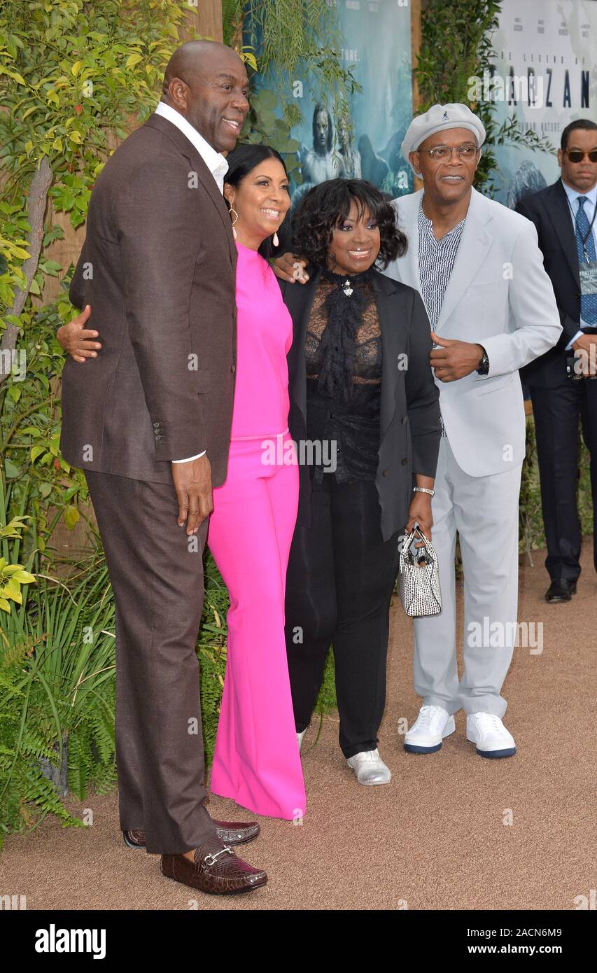 LOS ANGELES, CA. June 27, 2016: Earvin Magic Johnson & wife Cookie Johnson with actor Samuel L. Jackson & wife actress LaTanya Richardson Jackson at the world premiere of 'The Legend of Tarzan' at the Dolby Theatre, Hollywood. © 2016 Paul Smith / Featureflash Stock Photo