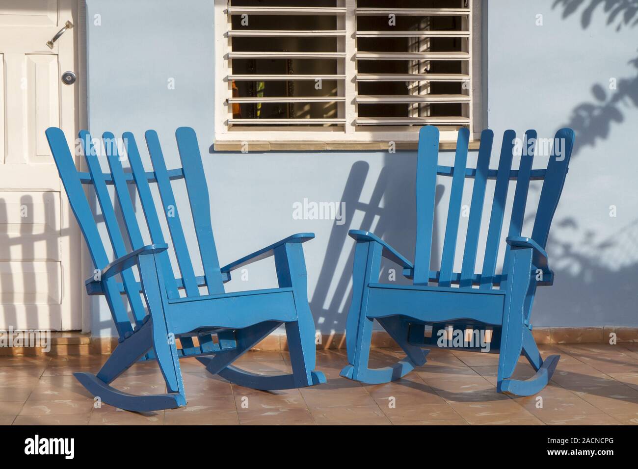 Rocking chairs in front of a Cuban house Stock Photo