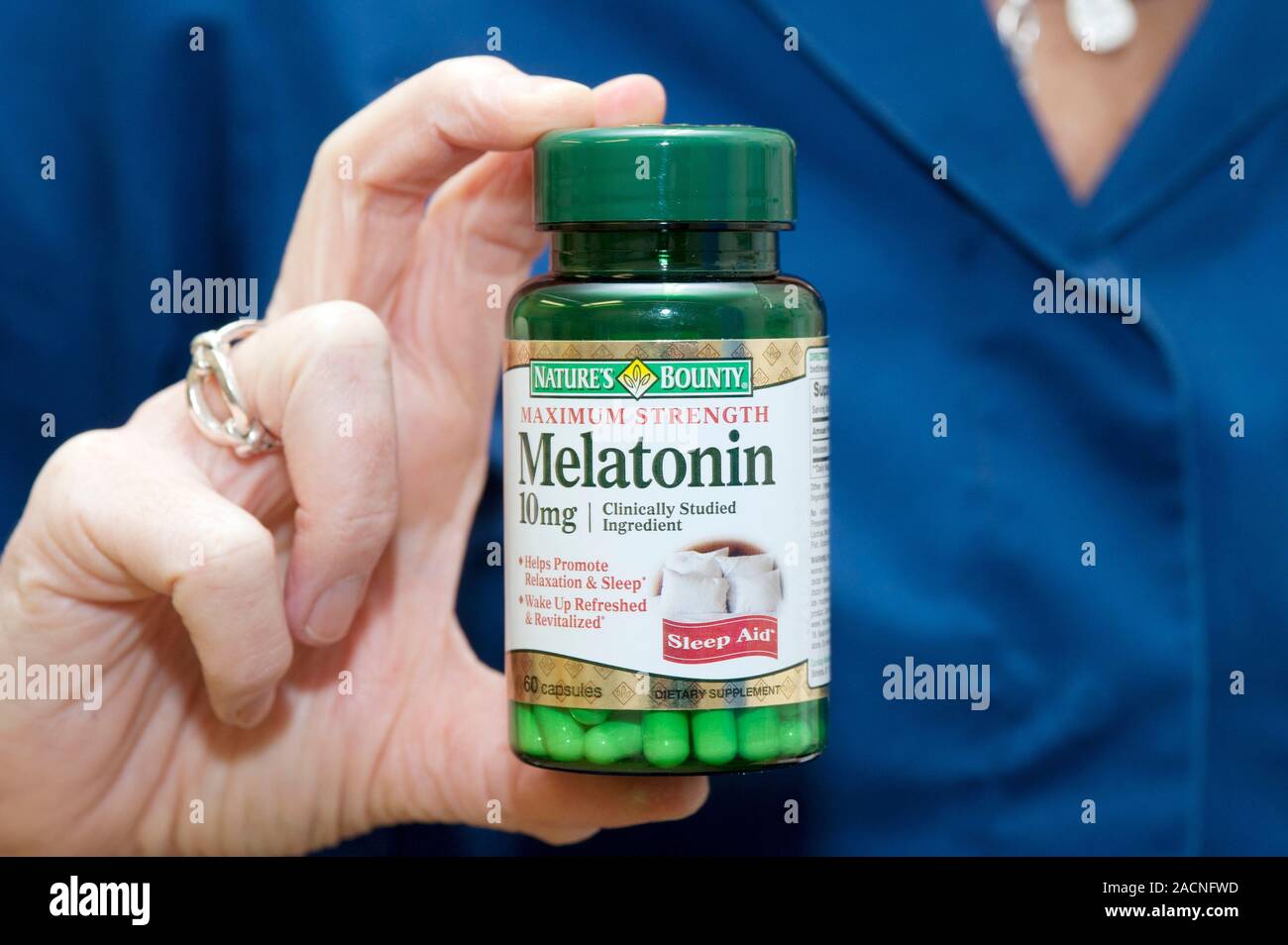 Bottle Of Melatonin Capsules A Hormone Which Controls The Biological   Bottle Of Melatonin Capsules A Hormone Which Controls The Biological Clock And Induces Sleep And Is Claimed To Slow Aging 2ACNFWD 