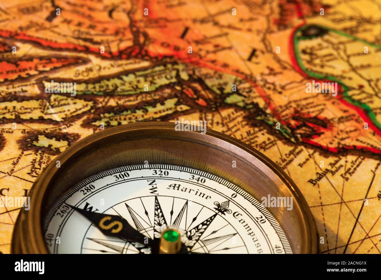 Old compass with map Stock Photo - Alamy