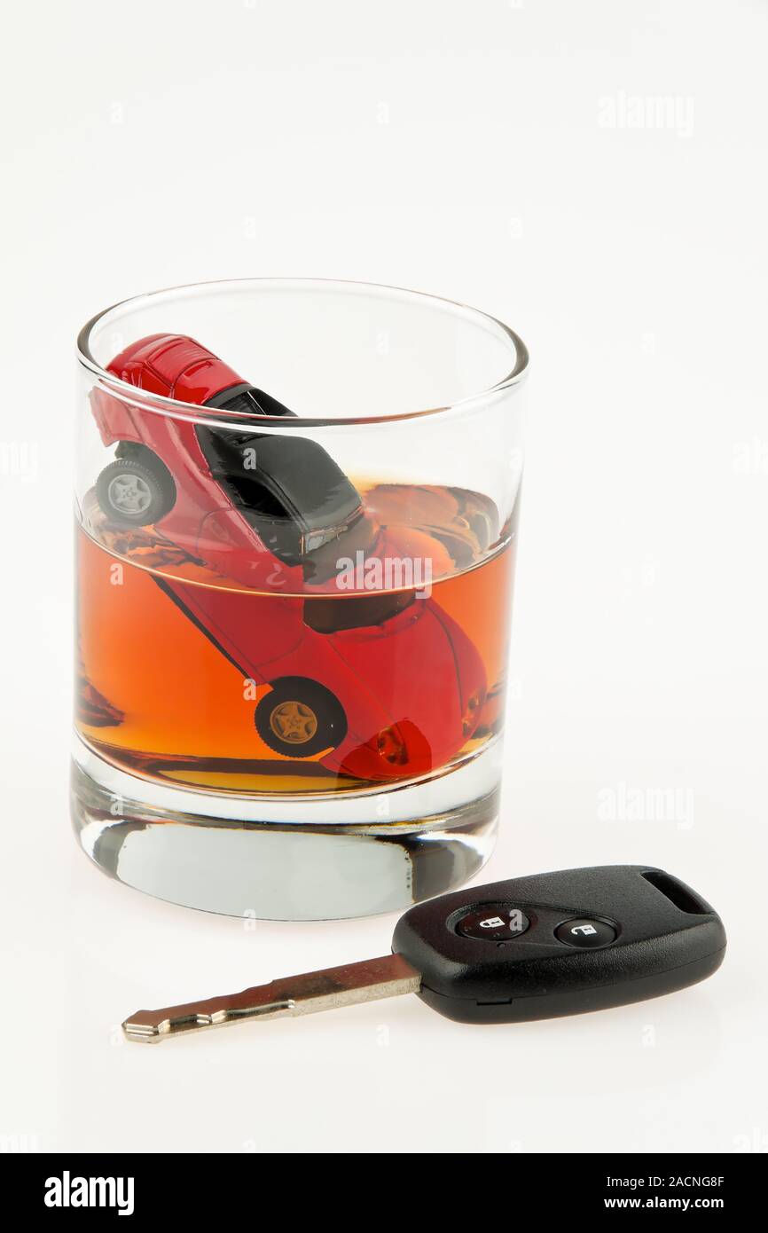 Alcohol and car. Drivers of booze. Drunk driving. Stock Photo