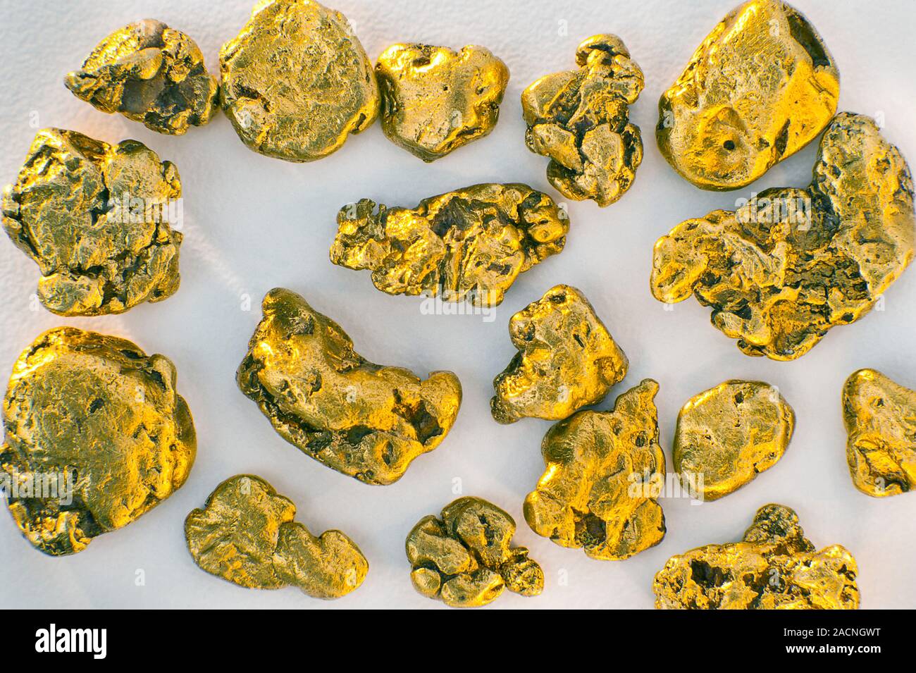 Gold nuggets. Gold (Au) is a transition metal element. It has a melting