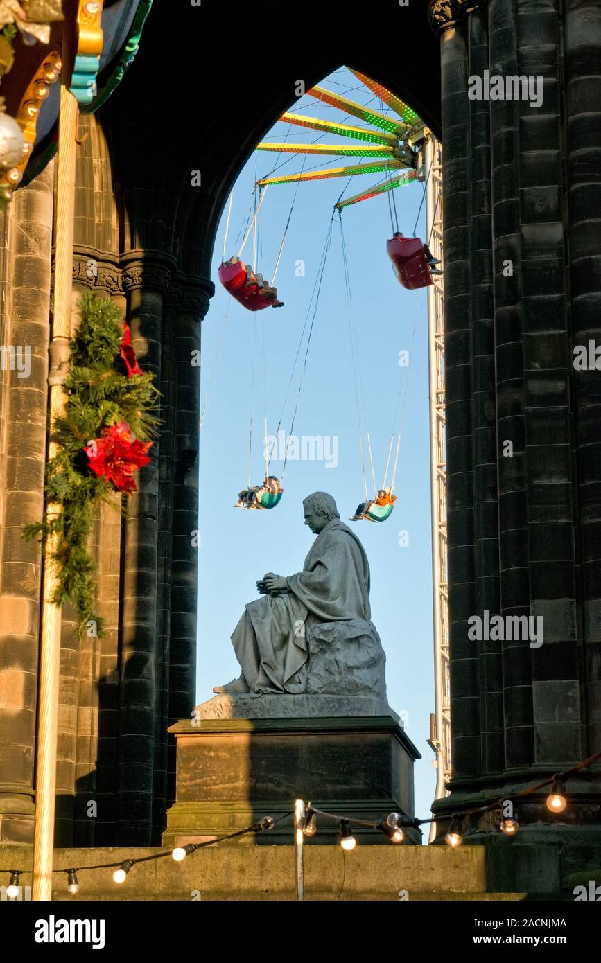 Walter Scott Monument and high Star Flyer fairground ride. Edinburgh