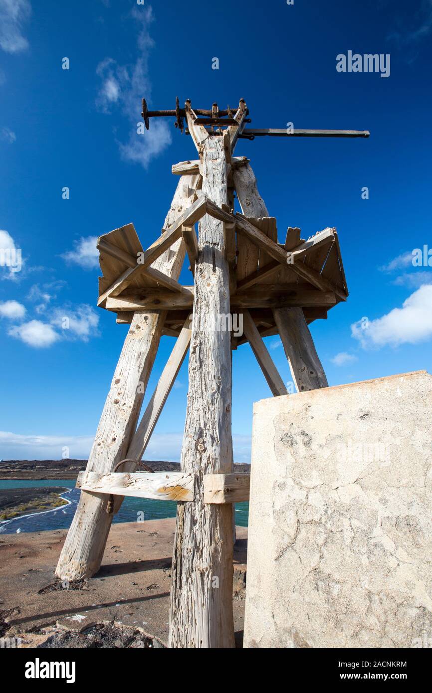 An old windmill for pumping seawater up into the salt pans at Salinas de Janubio on Lanzarote, Canary Islands. Stock Photo