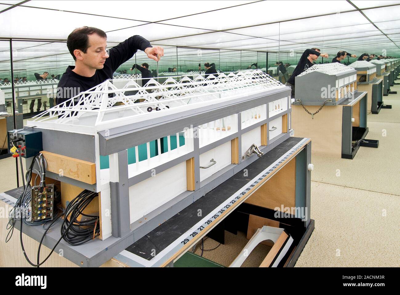 Testing Models Architectural Architecture testing lab. Model of a new building being tested under an ...