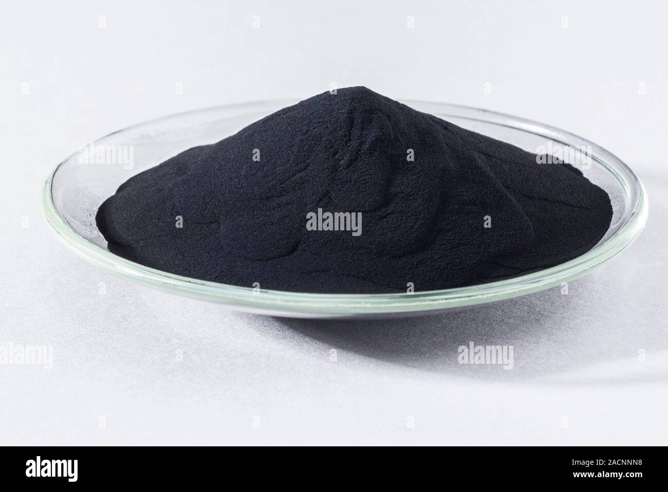 Copper (II) oxide (CuO). This chemical contains copper in a +2 oxidation state, giving rise to