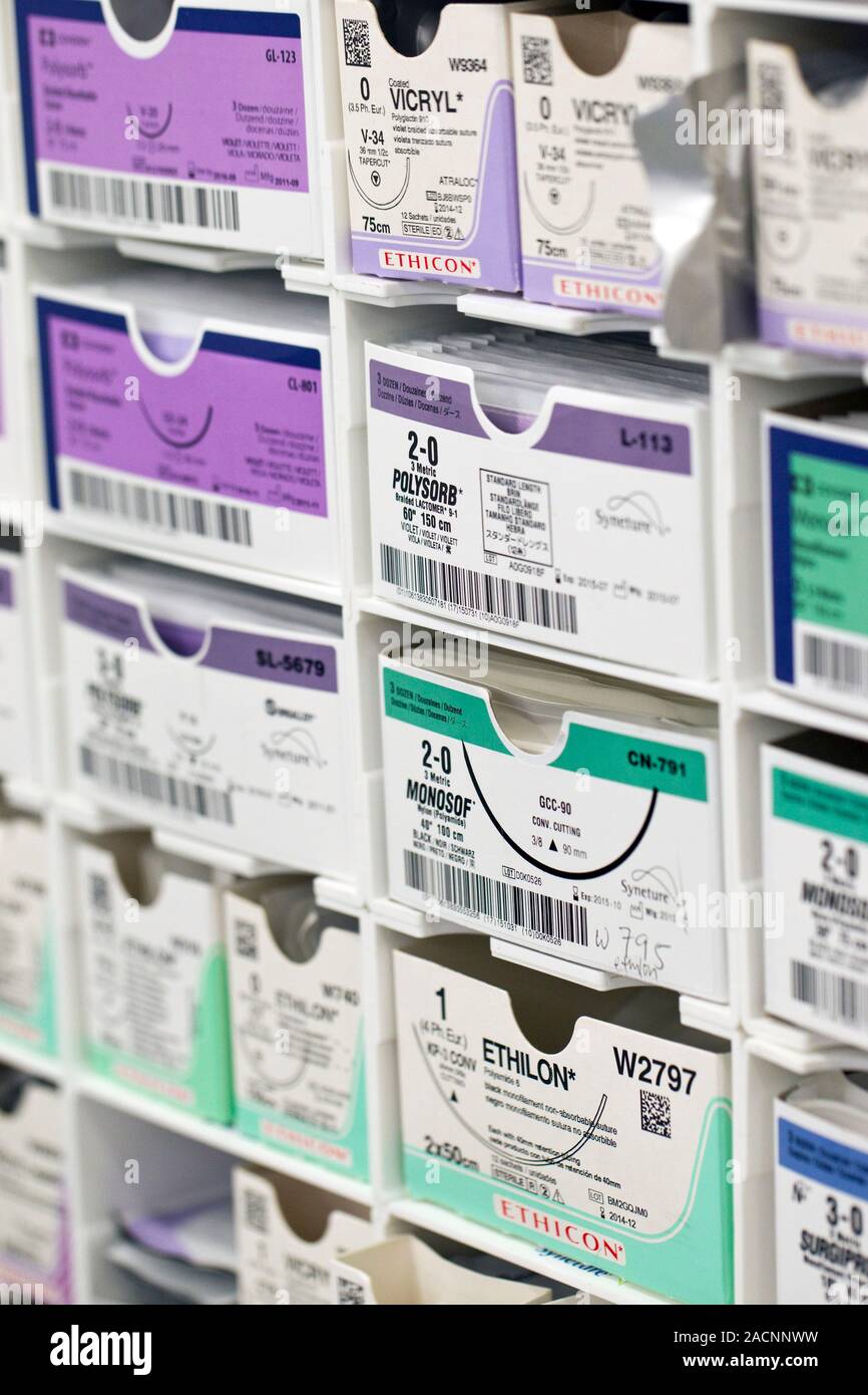Suture rack. Closeup of boxes containing different types and sizes of