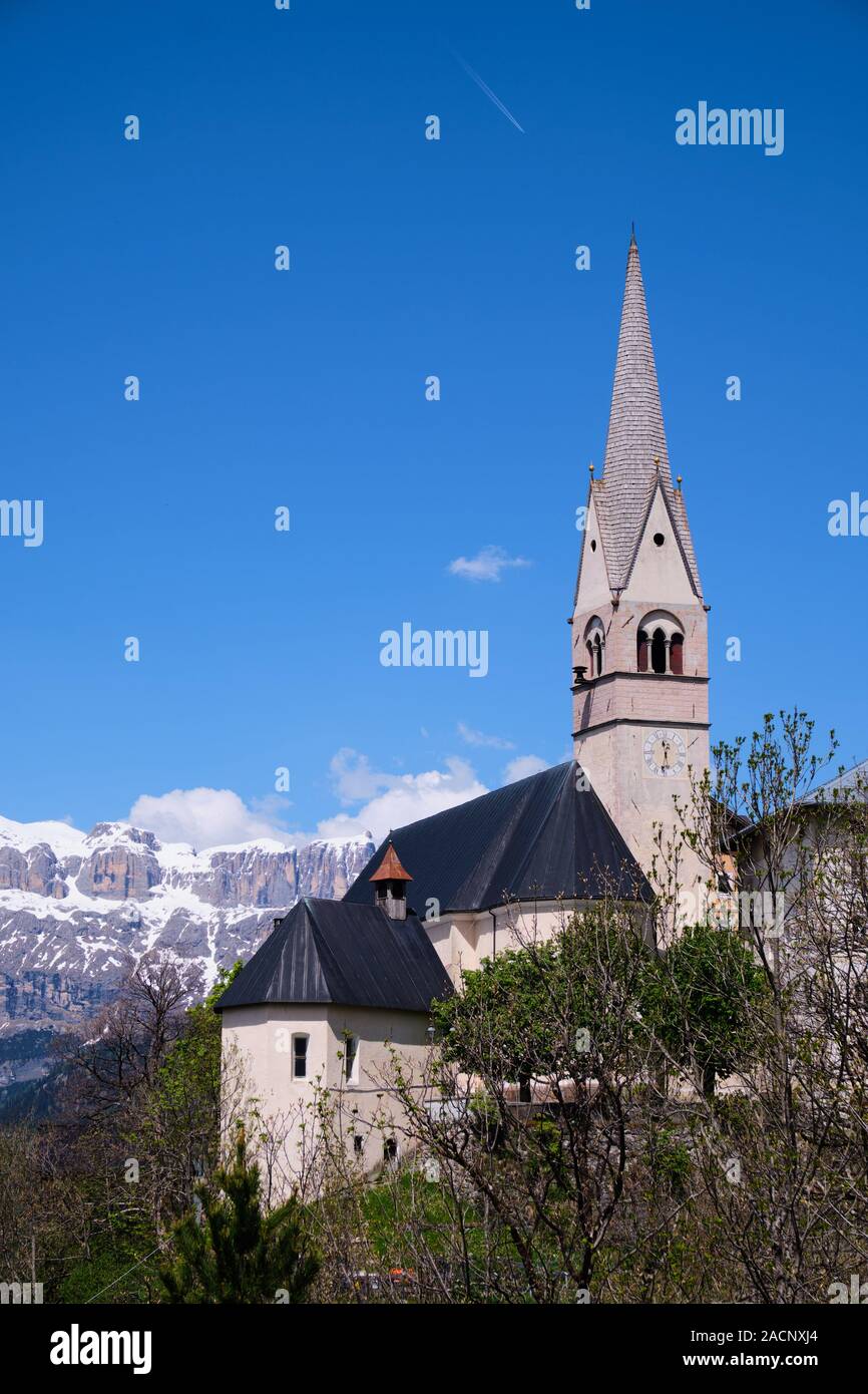 Image of church in village Livinallongo del Col di Lana in Italy, South Tirol Stock Photo