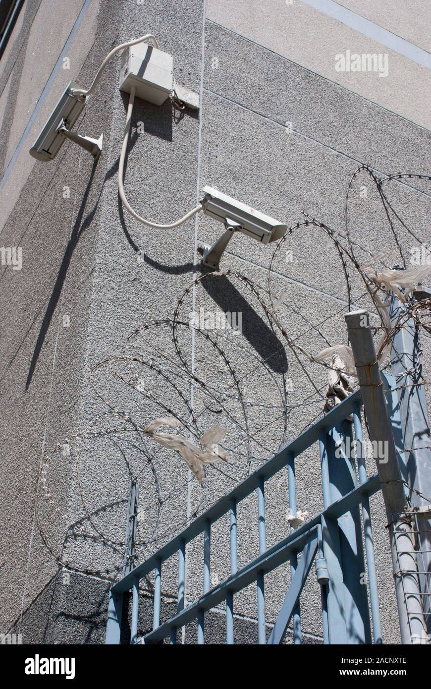 Building security cameras and razor wire in Cape Town, South Africa ...