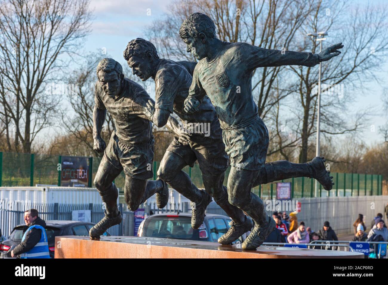 Tameside's World Cup Heroes, a sculpture by Andy Edwards depicting three world cup medal winners who were born in Tameside.  Ashton-under-Lyne, UK. Stock Photo