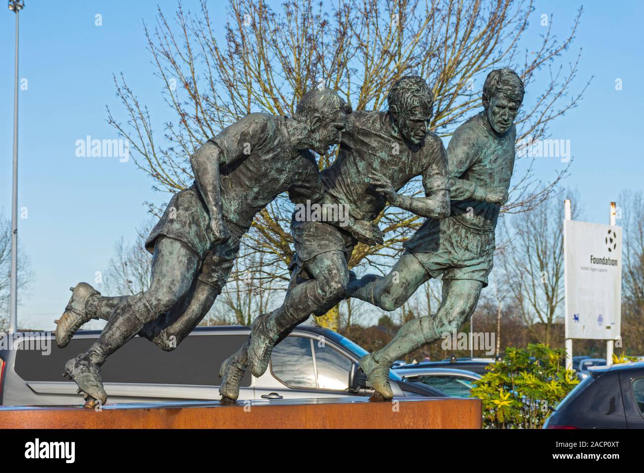 Tameside's World Cup Heroes, a sculpture by Andy Edwards depicting three world cup medal winners who were born in Tameside.  Ashton-under-Lyne, UK. Stock Photo