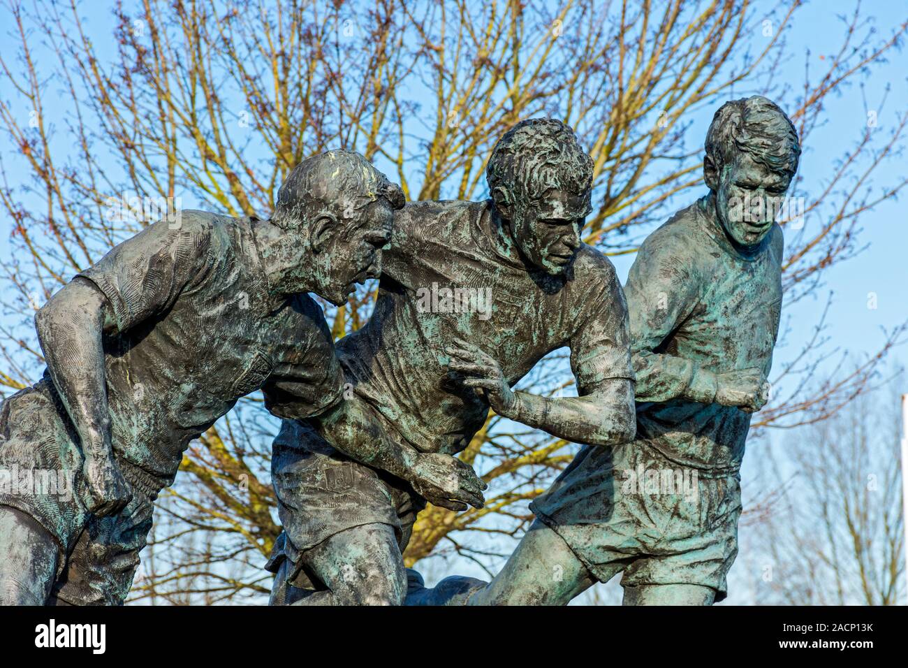 Tameside's World Cup Heroes, a sculpture by Andy Edwards depicting three world cup medal winners who were born in Tameside.  Ashton-under-Lyne, UK. Stock Photo