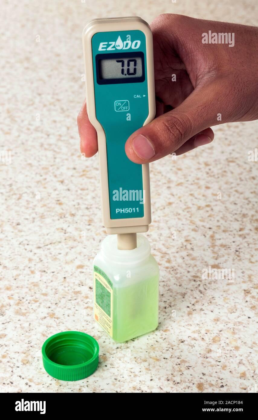 Calibrating a pH meter. Buffer solution (green) being used to calibrate
