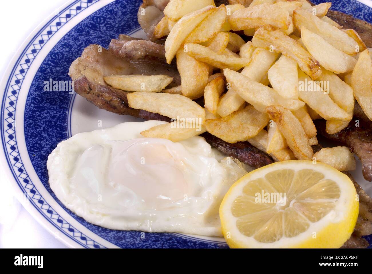 fried potatoes with egg and meat Stock Photo Alamy