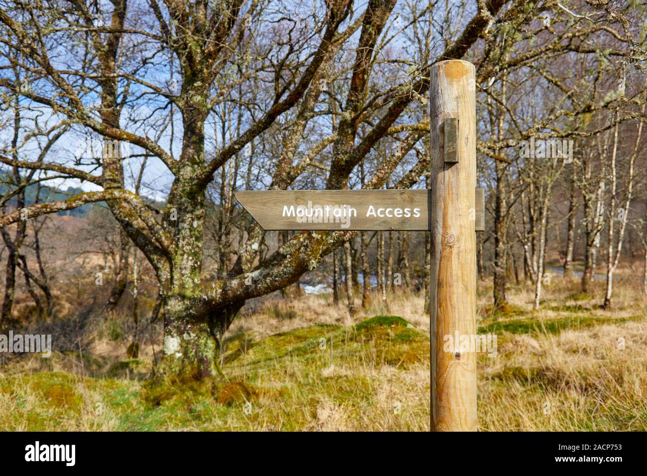 Mountain Access wooden directional sign post in remote area, Glen of Orchy, Scotland Stock Photo