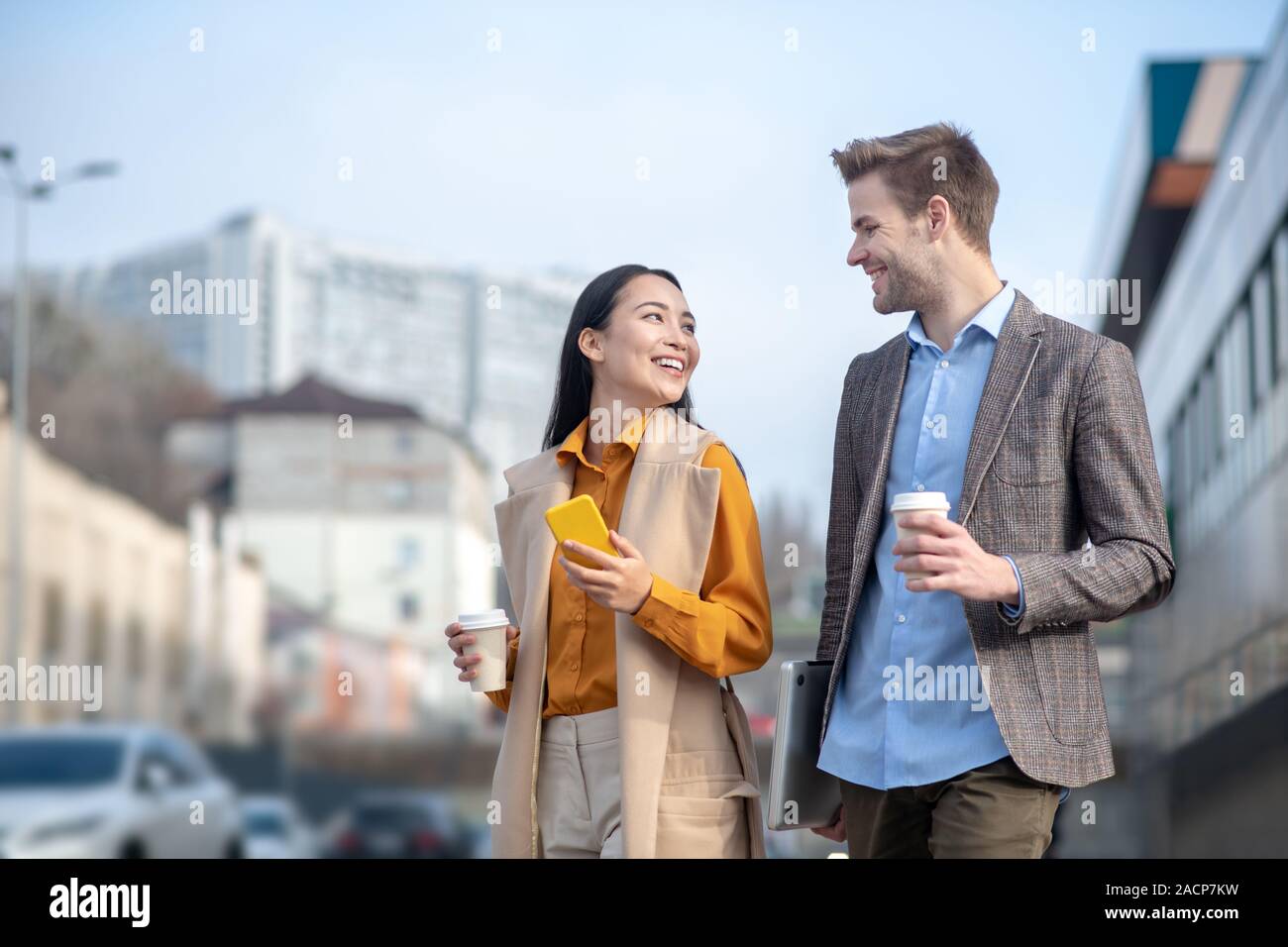 Man looking woman after street hi-res stock photography and images - Alamy