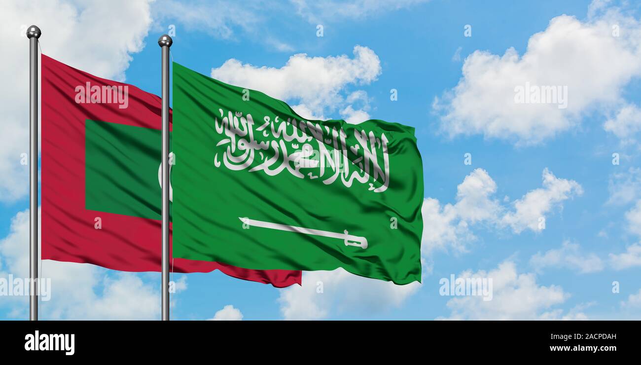 Maldives and Saudi Arabia flag waving in the wind against white cloudy blue  sky together. Diplomacy concept, international relations Stock Photo - Alamy