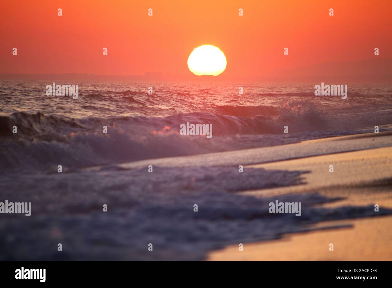 beautiful sunset at beach Stock Photo - Alamy