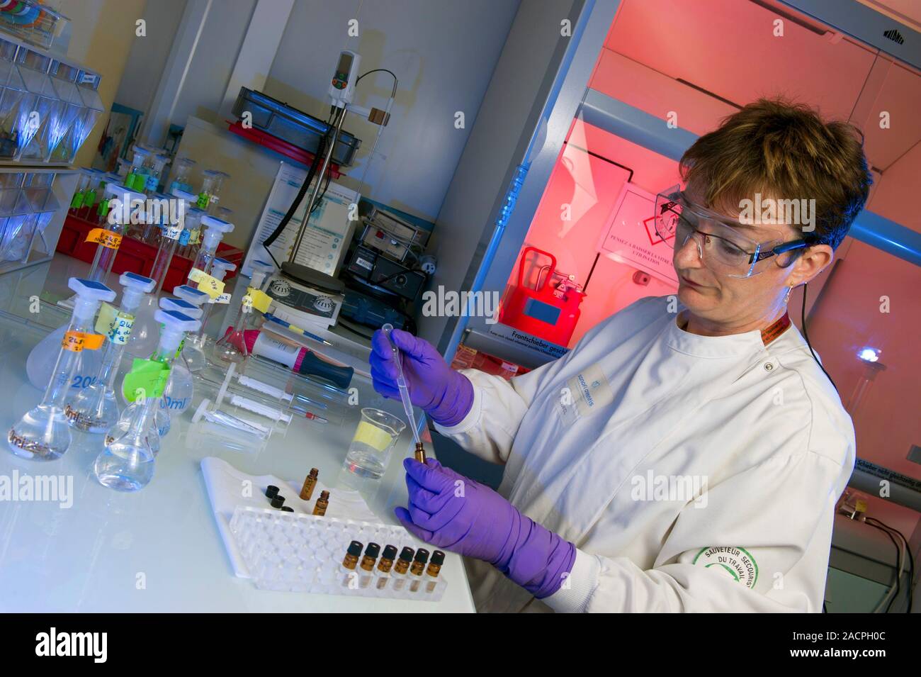 Counterfeit drugs analysis. Laboratory worker preparing drug samples