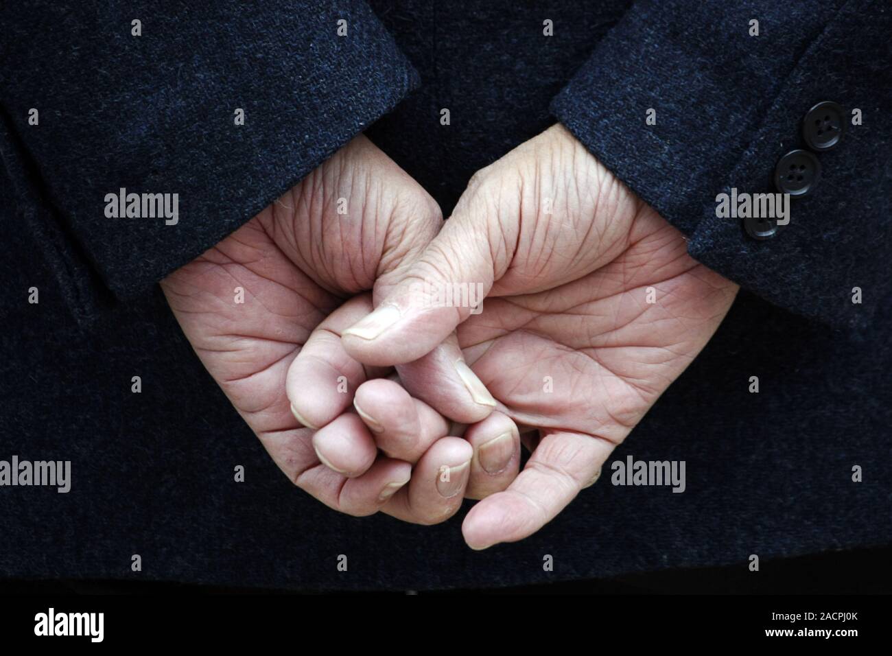 Old man hands behind back hi-res stock photography and images - Alamy