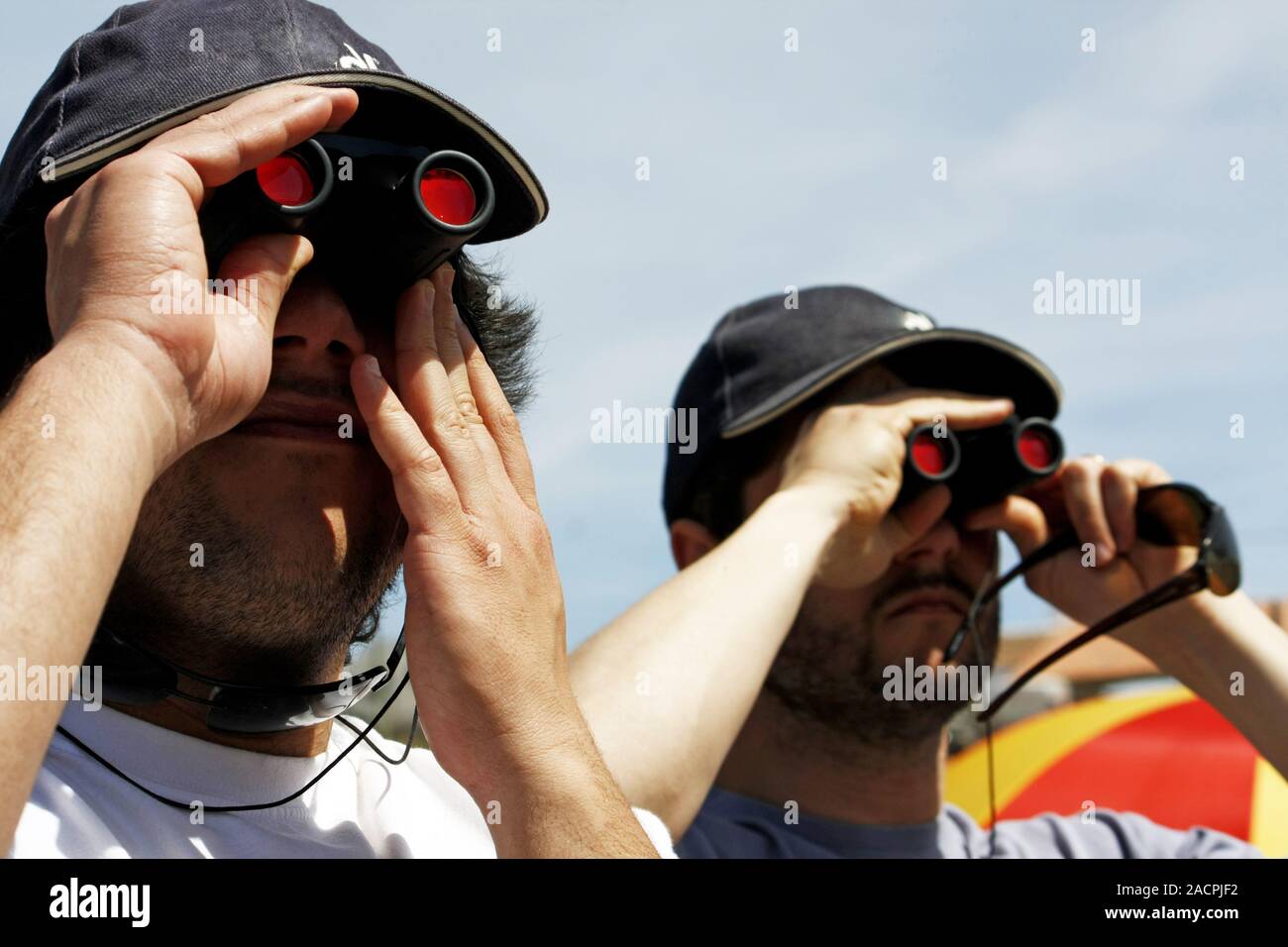 Two binocular users Stock Photo