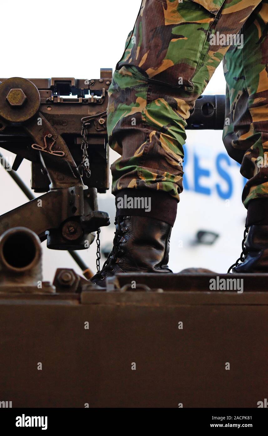 Mounted Machine Gun and marine leg Stock Photo