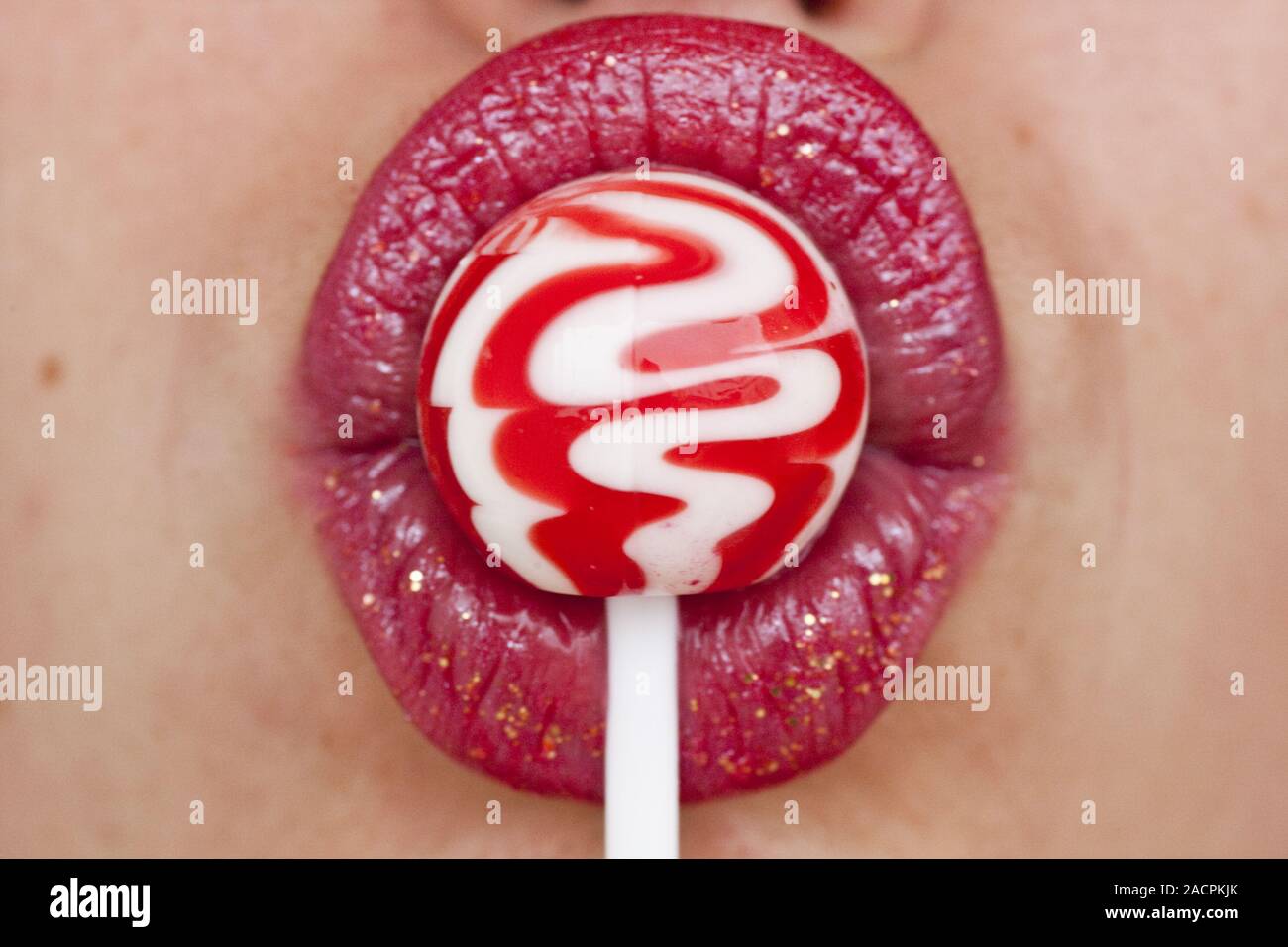 red lips with lollipop Stock Photo - Alamy