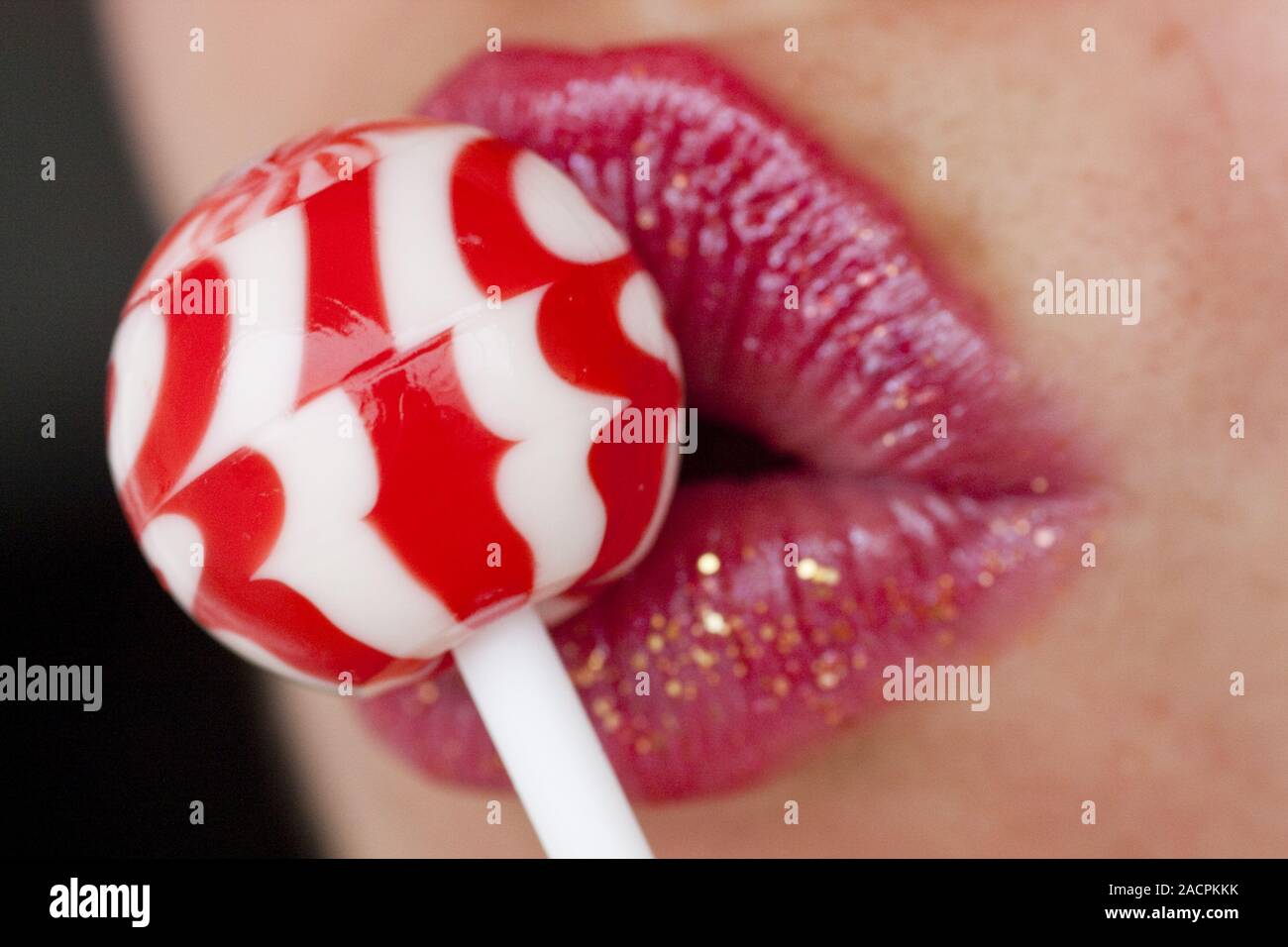 red lips with lollipop Stock Photo