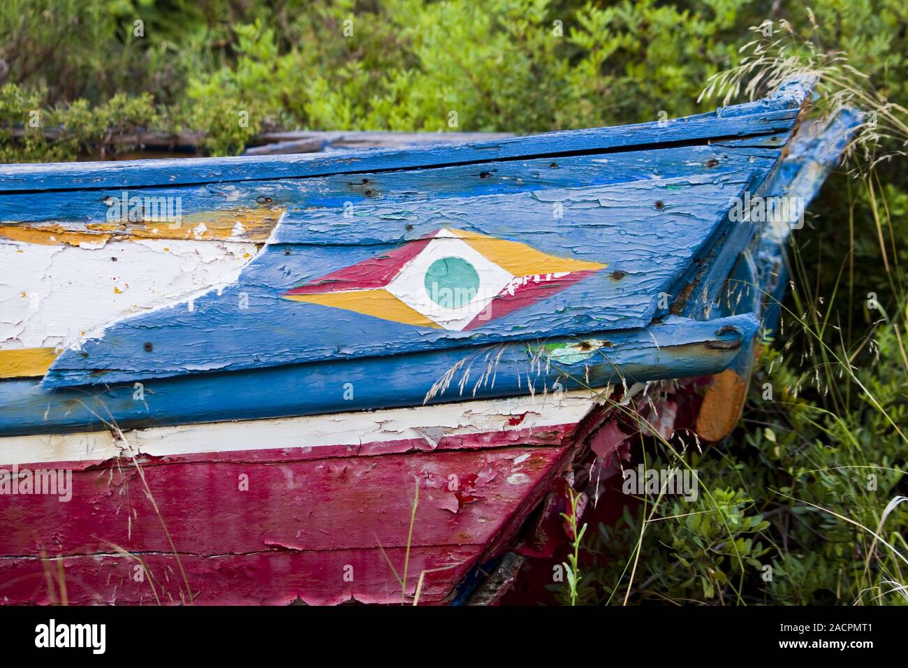 colorful detail of abandoned fishing boat Stock Photo