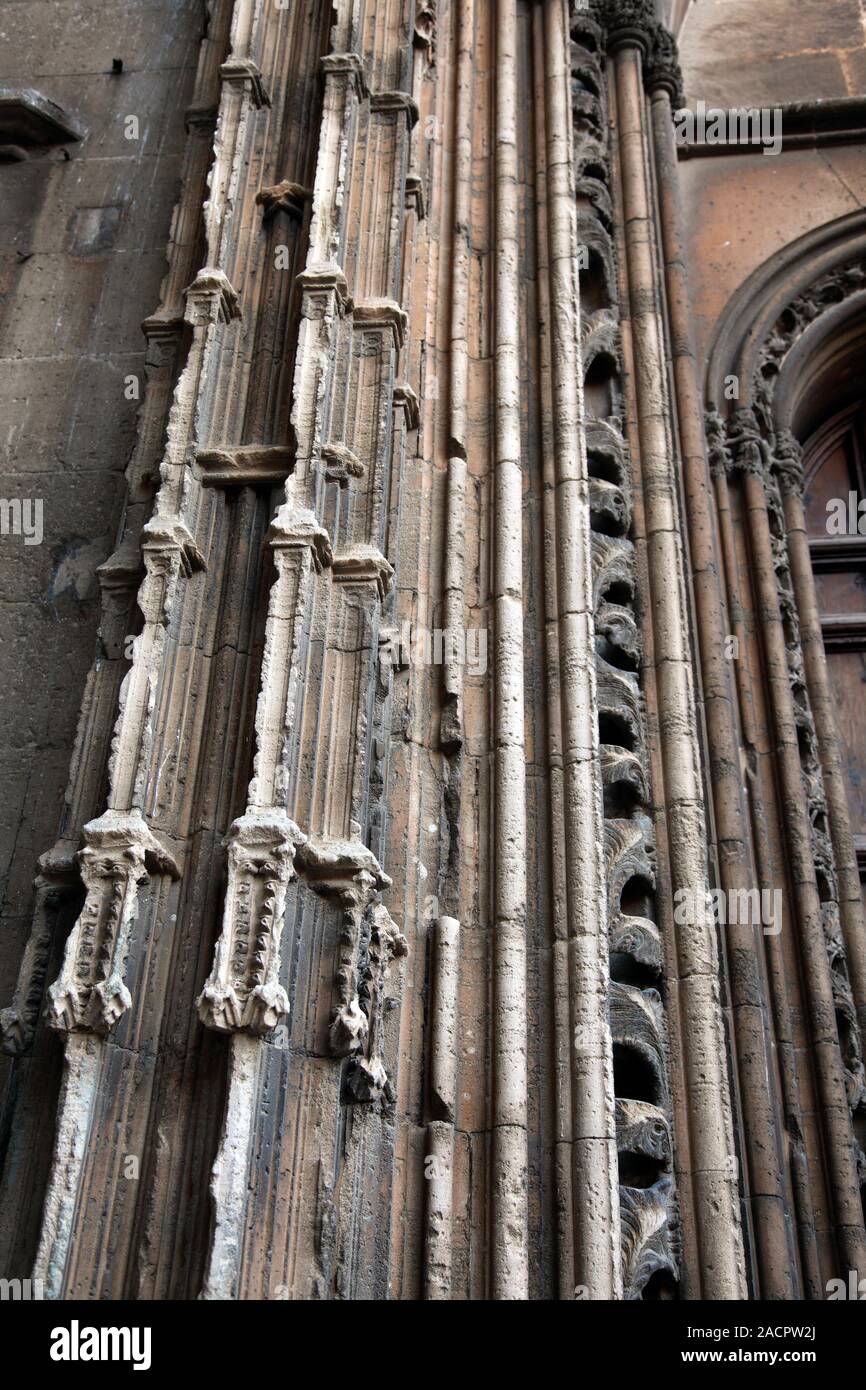 Eroded limestone building. Closeup of carved architectural features on a cathedral, showing the