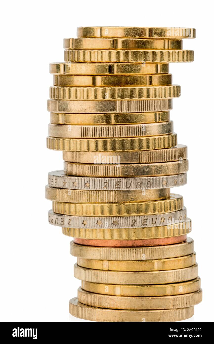 Stack of money coins against a white background Stock Photo