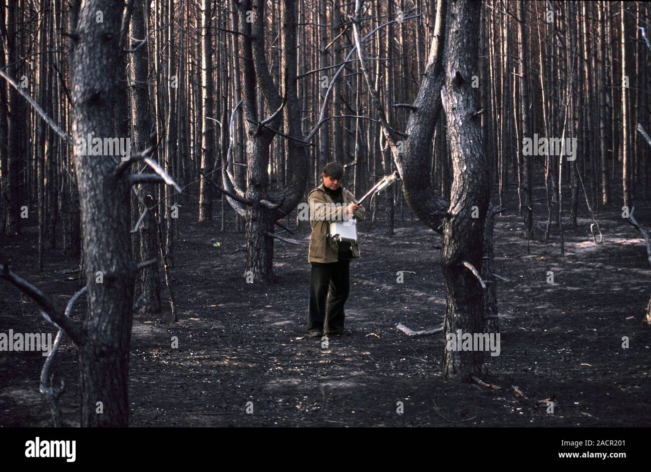 Chernobyl disaster environmental research. Scientist measuring the