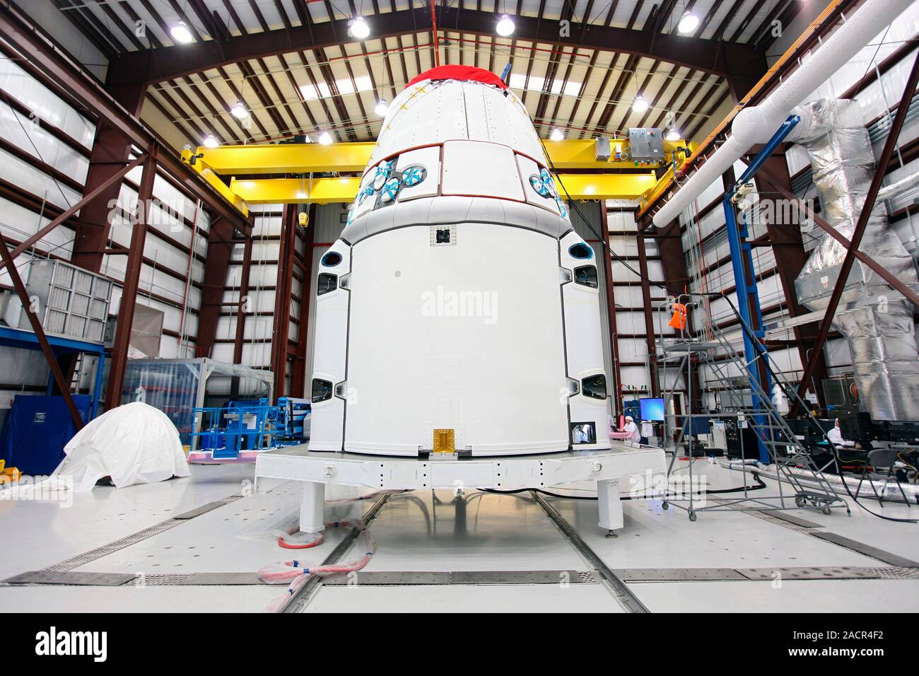 SpaceX Dragon capsule preparations. Space Exploration Technologies ...