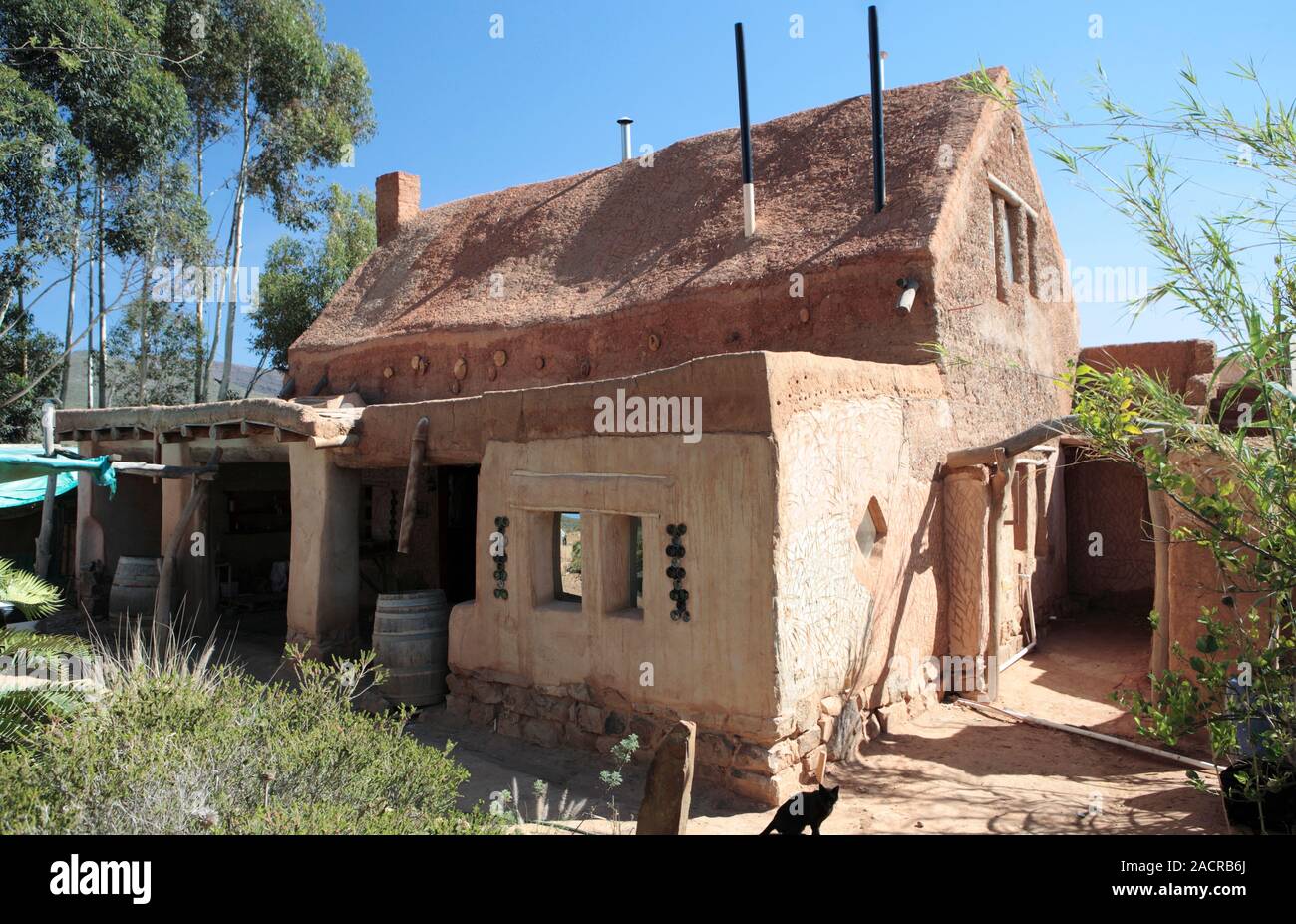 Cob house. Cob is a traditional building material consisting of clay