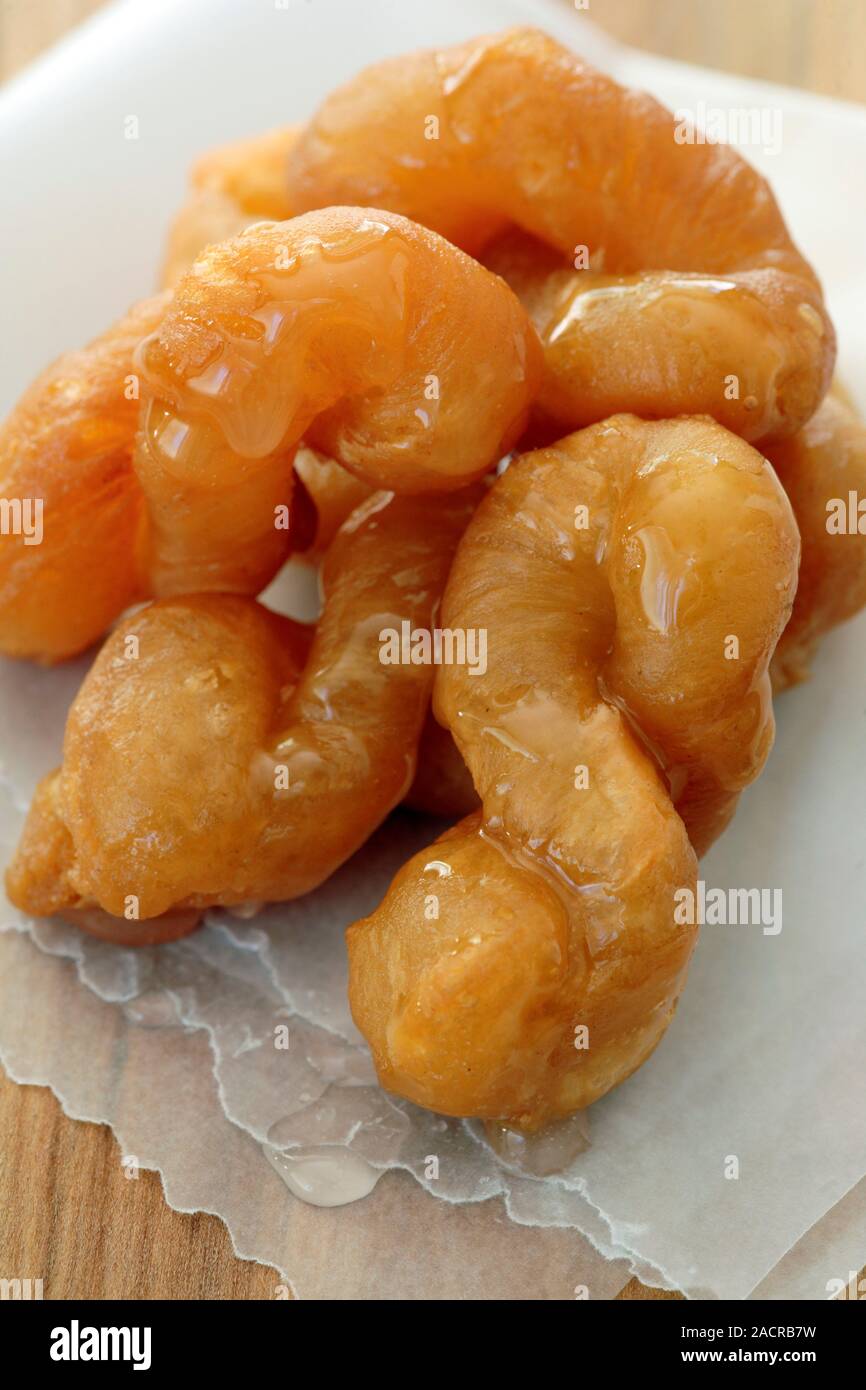 Koeksisters. These are a traditional syrup-coated twisted South African ...