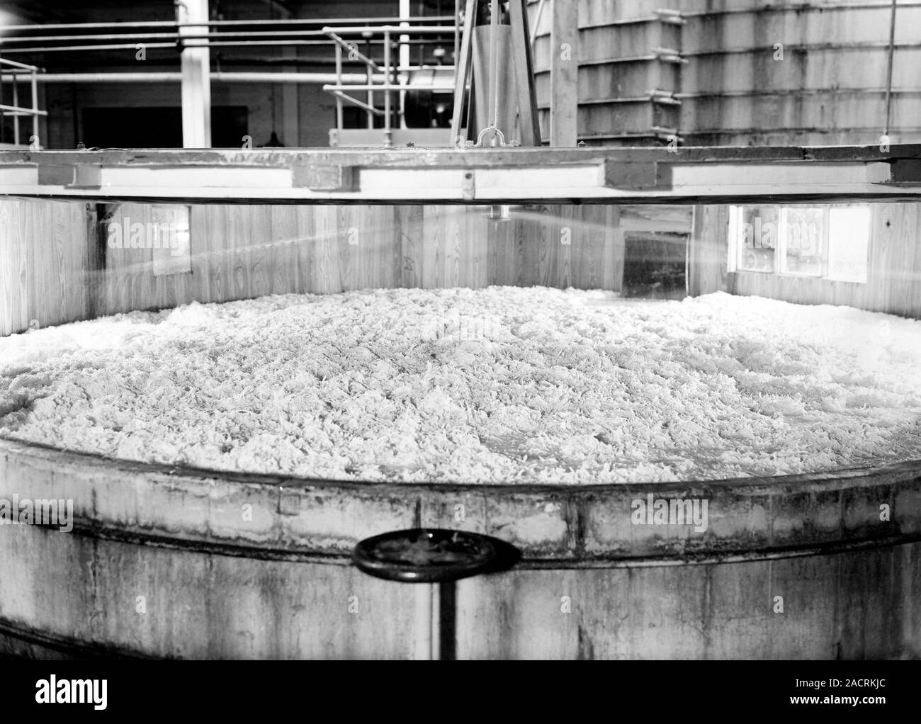 Rayon production. Vat being used to wash cellulose acetate. This stage