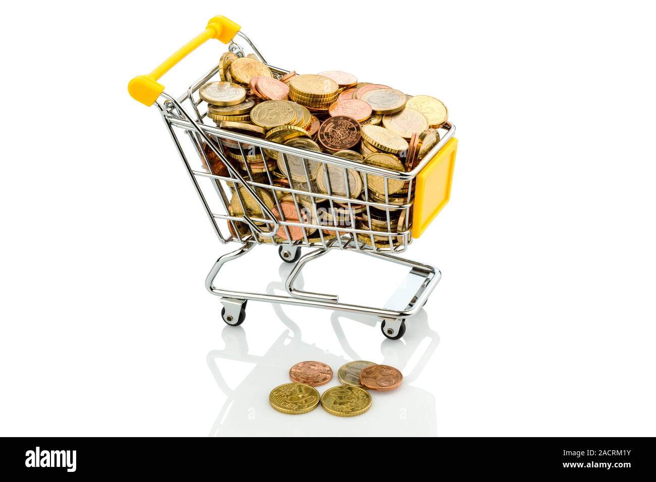 Shopping trolley with coins Stock Photo Alamy