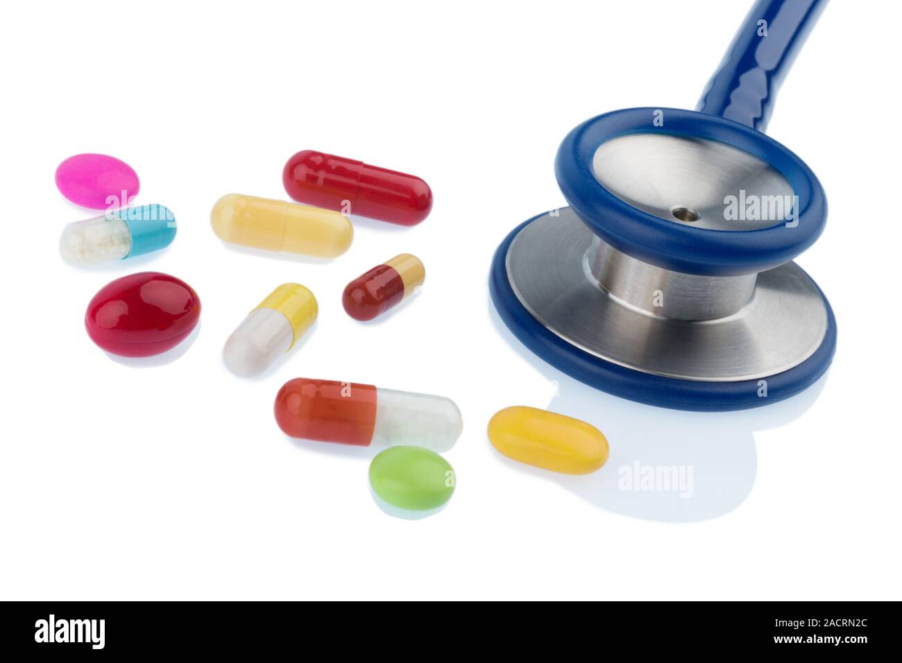 Colored tablets a stethoscope Stock Photo - Alamy