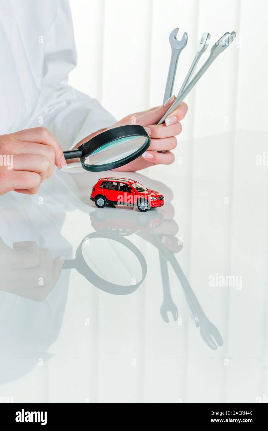 Car is examined by doctor Stock Photo