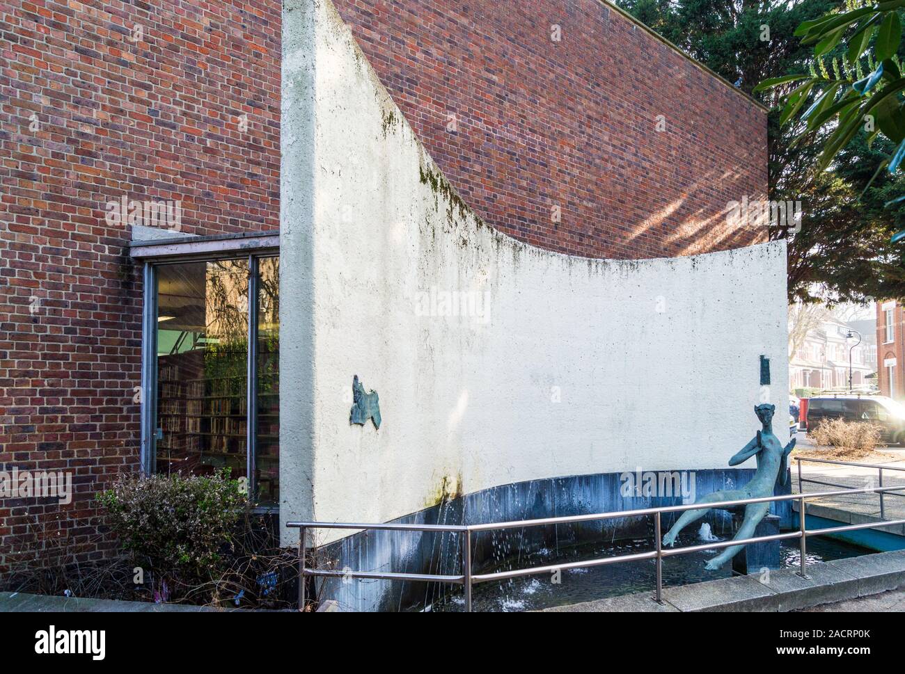 Sculpture by T E HuxleyJones at Hornsey Library, by F Ley and G F S