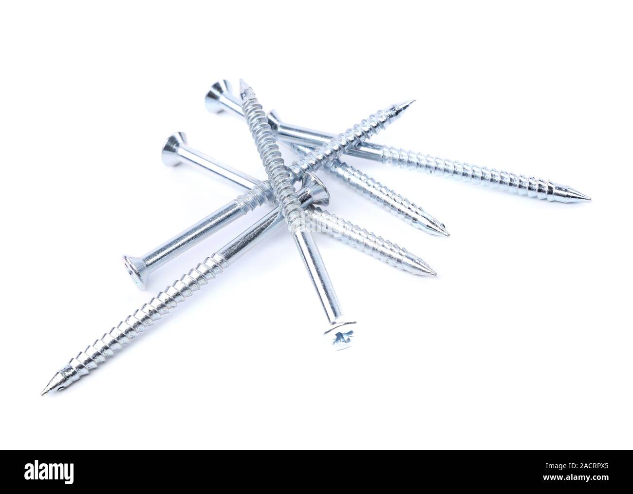 Random pile of threaded steel screws on white Stock Photo - Alamy