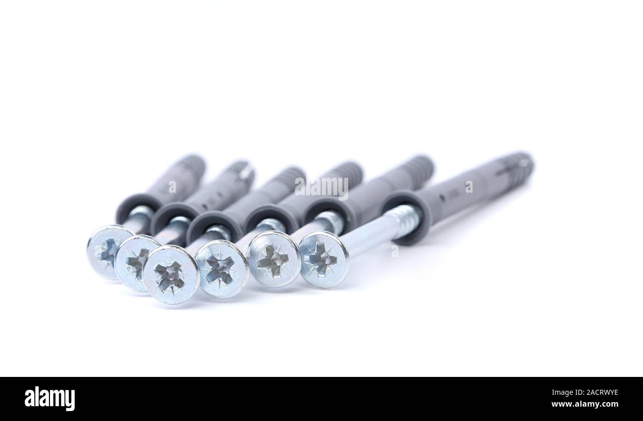 Screws and dowels isolated on white background Stock Photo