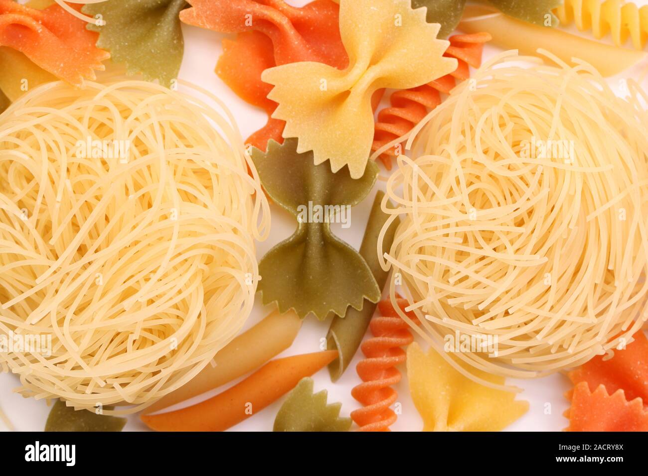 Capelli d'angelo on background of different pasta Stock Photo Alamy