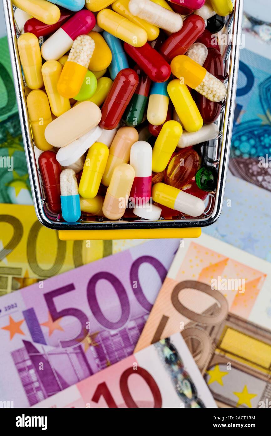 Tablets, Shopping Cart, Euro Notes Stock Photo