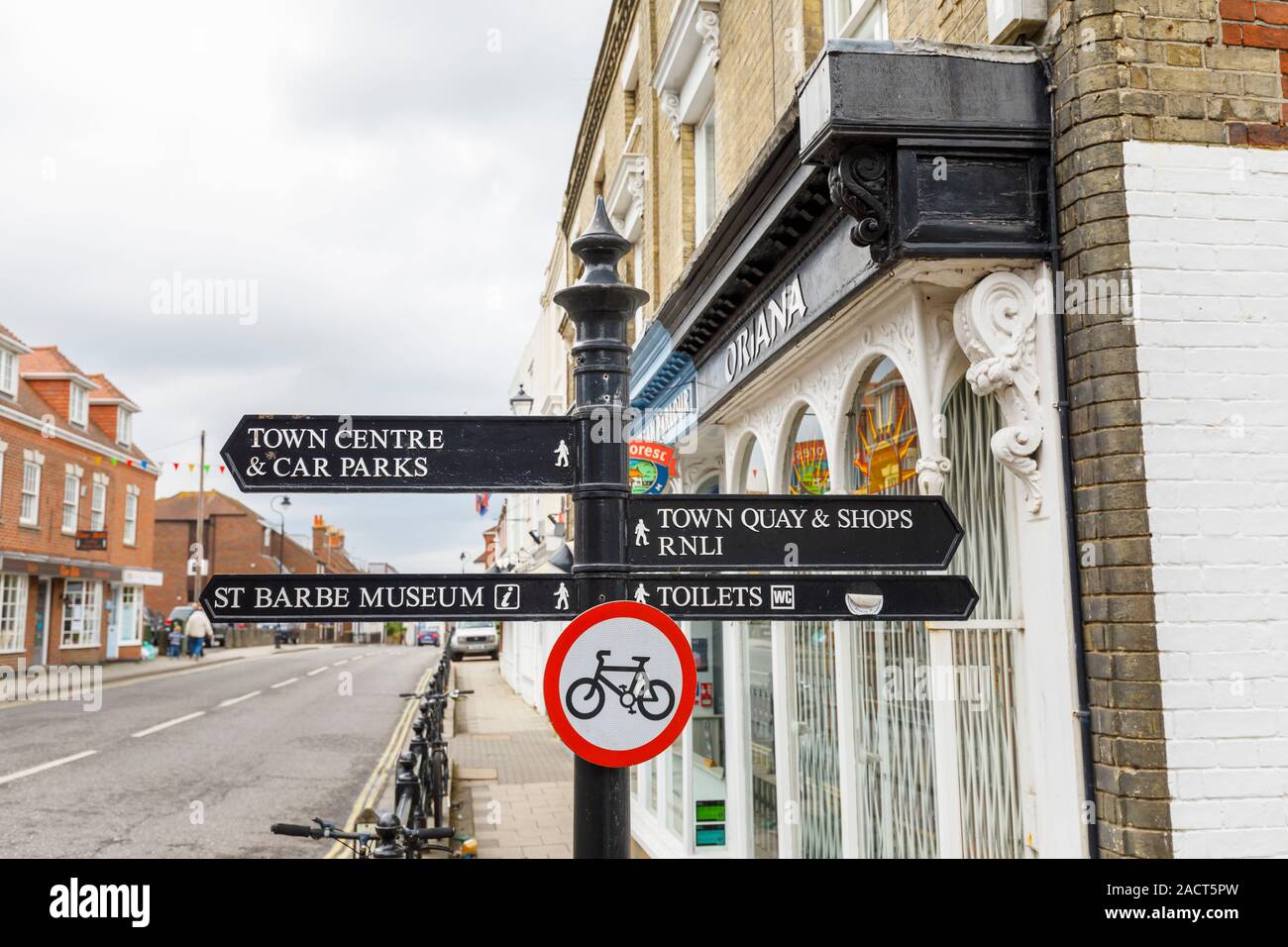 Signpost pointing to local amenities and attractions in Lymington, New Forest district of Hampshire, southern England, UK Stock Photo