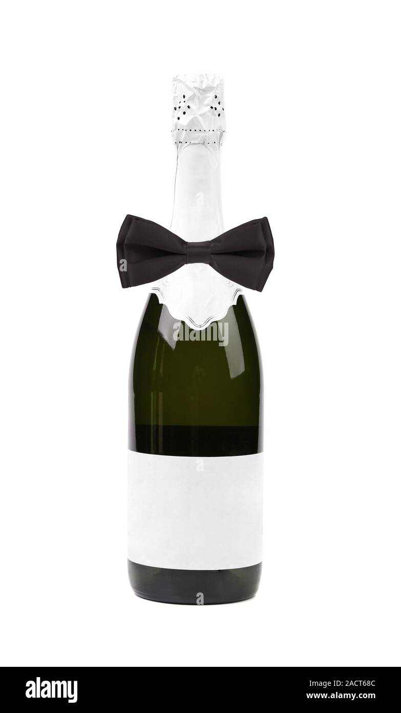 Black bow tie on bottle of champagne. Stock Photo